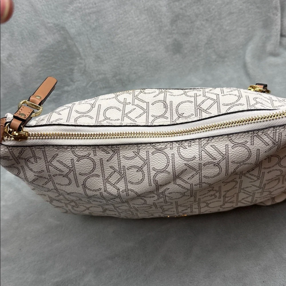 Calvin Klein Logo Print Hobo Bag in Cream and Brown